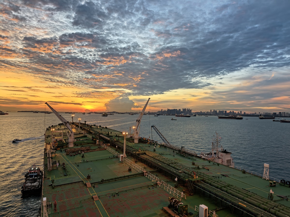 Oil tanker ship sailing on the ocean, representing global energy supply chains and the Strait of Hormuz