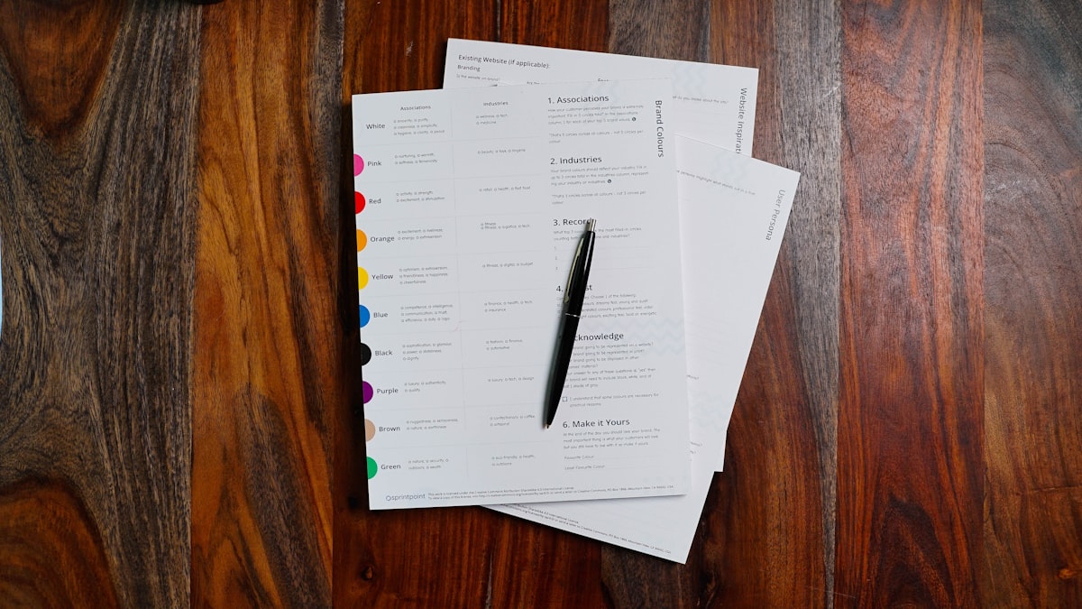 Stack of papers and documents for home energy audit review and planning