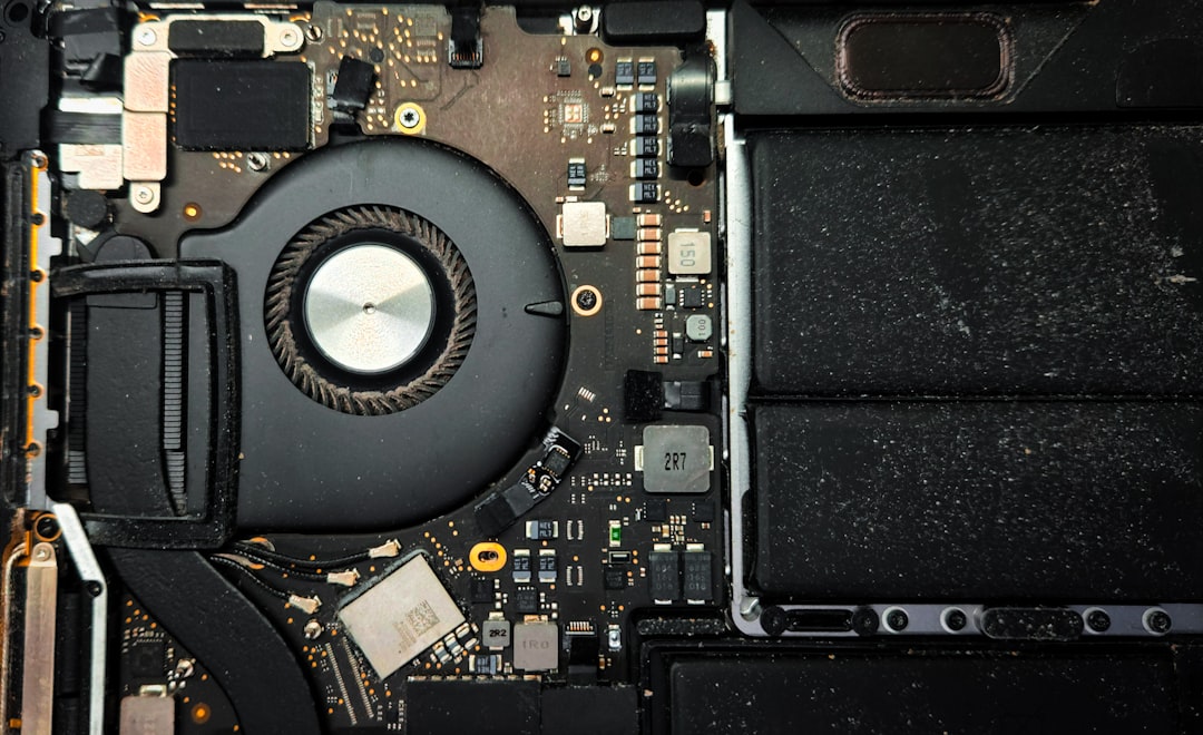Close-up of a device being repaired with third-party components, reinforcing the right to use independent parts